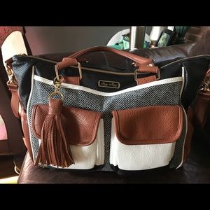 Itzy ritzy triple threat diaper bag